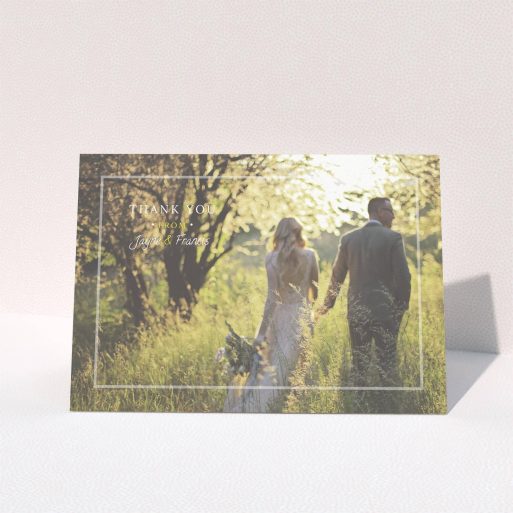 A photo wedding thank you card called "Not even there". It is an A5 card in a landscape orientation. It is a photographic photo wedding thank you card with room for 1 photo. "Not even there" is available as a folded card, with mainly white colouring.