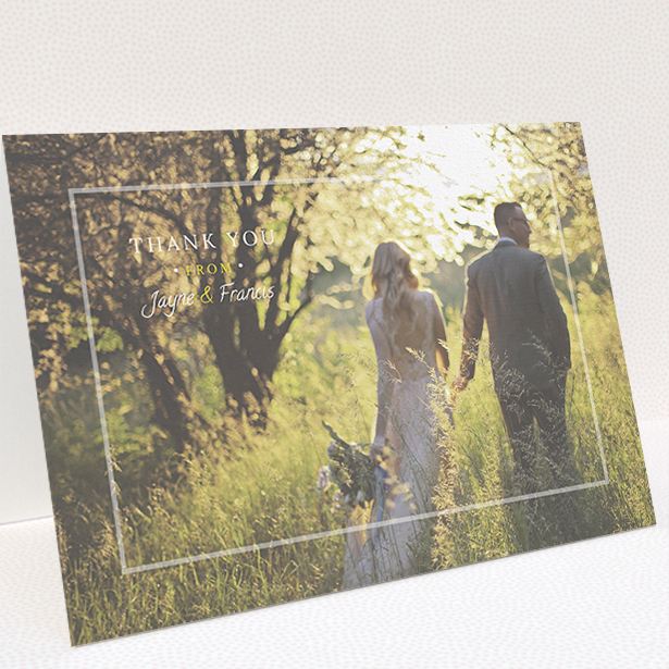 A photo wedding thank you card called "Not even there". It is an A5 card in a landscape orientation. It is a photographic photo wedding thank you card with room for 1 photo. "Not even there" is available as a folded card, with mainly white colouring.