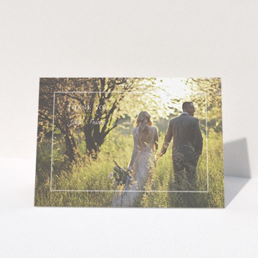 A photo wedding thank you card template titled "Not even there". It is an A6 card in a landscape orientation. It is a photographic photo wedding thank you card with room for 1 photo. "Not even there" is available as a folded card, with mainly white colouring.