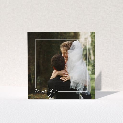 A photo wedding thank you card template titled "On Photo Border". It is a square (148mm x 148mm) card in a square orientation. It is a photographic photo wedding thank you card with room for 1 photo. "On Photo Border" is available as a folded card, with mainly white colouring.