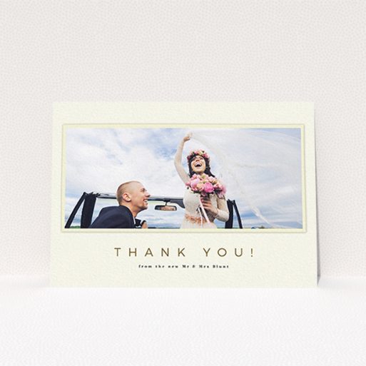 A photo wedding thank you card design named "One white Polaroid ". It is an A6 card in a landscape orientation. It is a photographic photo wedding thank you card with room for 1 photo. "One white Polaroid " is available as a flat card, with mainly cream colouring.