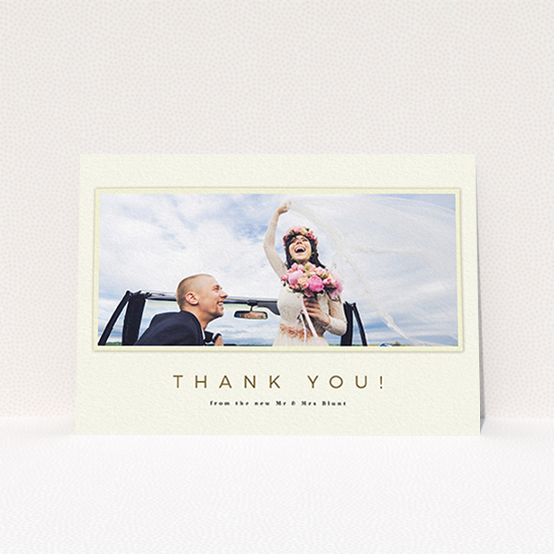 A photo wedding thank you card design named "One white Polaroid ". It is an A6 card in a landscape orientation. It is a photographic photo wedding thank you card with room for 1 photo. "One white Polaroid " is available as a flat card, with mainly cream colouring.