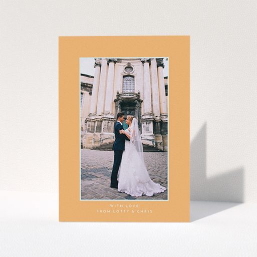 A photo wedding thank you card design titled "Orange and blue". It is an A6 card in a portrait orientation. It is a photographic photo wedding thank you card with room for 1 photo. "Orange and blue" is available as a folded card, with tones of orange and blue.