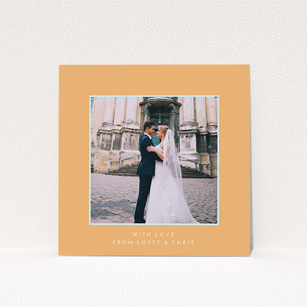 A photo wedding thank you card design called "Orange and blue". It is a square (148mm x 148mm) card in a square orientation. It is a photographic photo wedding thank you card with room for 1 photo. "Orange and blue" is available as a flat card, with tones of orange and blue.