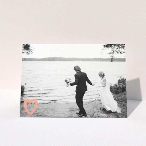 A photo wedding thank you card named "Pastel peach heart". It is an A5 card in a landscape orientation. It is a photographic photo wedding thank you card with room for 1 photo. "Pastel peach heart" is available as a folded card, with mainly light pink colouring.