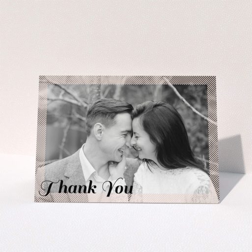 A photo wedding thank you card design called "Peach Over-Frame". It is an A6 card in a landscape orientation. It is a photographic photo wedding thank you card with room for 1 photo. "Peach Over-Frame" is available as a folded card, with mainly light pink colouring.