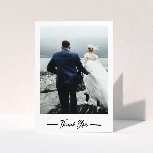 A photo wedding thank you card called "Portrait Thank You Photo". It is an A5 card in a portrait orientation. It is a photographic photo wedding thank you card with room for 1 photo. "Portrait Thank You Photo" is available as a folded card, with mainly white colouring.