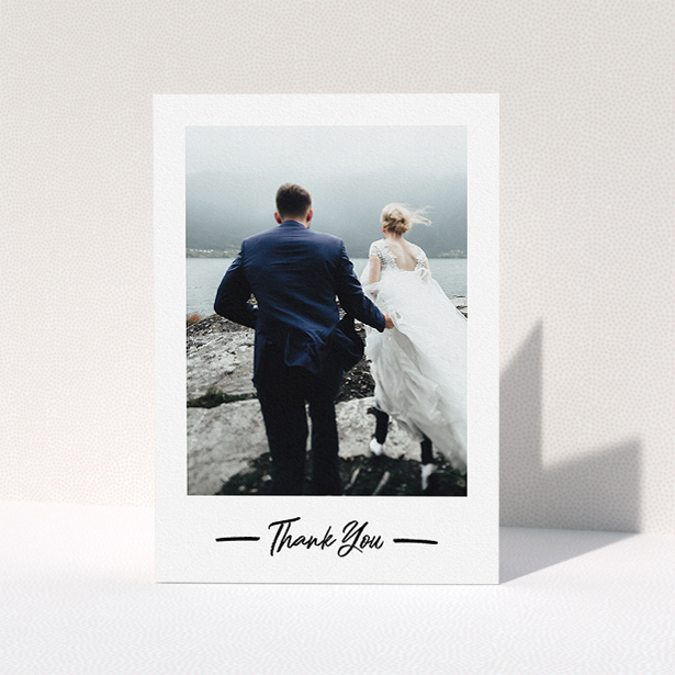 A photo wedding thank you card called "Portrait Thank You Photo". It is an A5 card in a portrait orientation. It is a photographic photo wedding thank you card with room for 1 photo. "Portrait Thank You Photo" is available as a folded card, with mainly white colouring.
