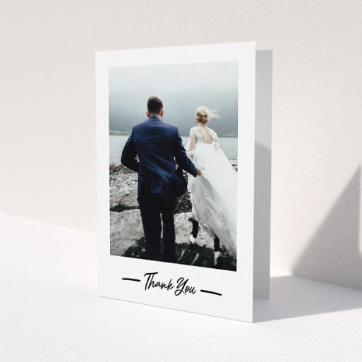 A photo wedding thank you card called 'Portrait Thank You Photo'. It is an A5 card in a portrait orientation. It is a photographic photo wedding thank you card with room for 1 photo. 'Portrait Thank You Photo' is available as a folded card, with mainly white colouring.