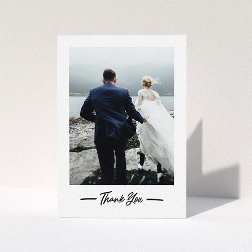 A photo wedding thank you card named "Portrait Thank You Photo". It is an A6 card in a portrait orientation. It is a photographic photo wedding thank you card with room for 1 photo. "Portrait Thank You Photo" is available as a folded card, with mainly white colouring.