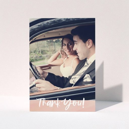 A photo wedding thank you card design titled "Pretty on Pink". It is an A6 card in a portrait orientation. It is a photographic photo wedding thank you card with room for 1 photo. "Pretty on Pink" is available as a folded card, with tones of pink and white.