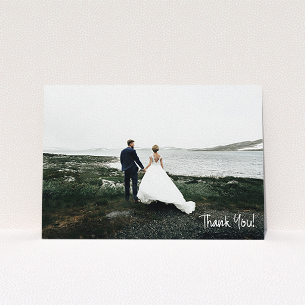 A photo wedding thank you card design named "Rough but Simple Photo". It is an A6 card in a landscape orientation. It is a photographic photo wedding thank you card with room for 1 photo. "Rough but Simple Photo" is available as a flat card, with mainly white colouring.
