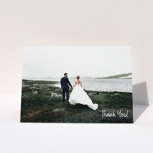 A photo wedding thank you card called "Rough but Simple Photo". It is an A6 card in a landscape orientation. It is a photographic photo wedding thank you card with room for 1 photo. "Rough but Simple Photo" is available as a folded card, with mainly white colouring.