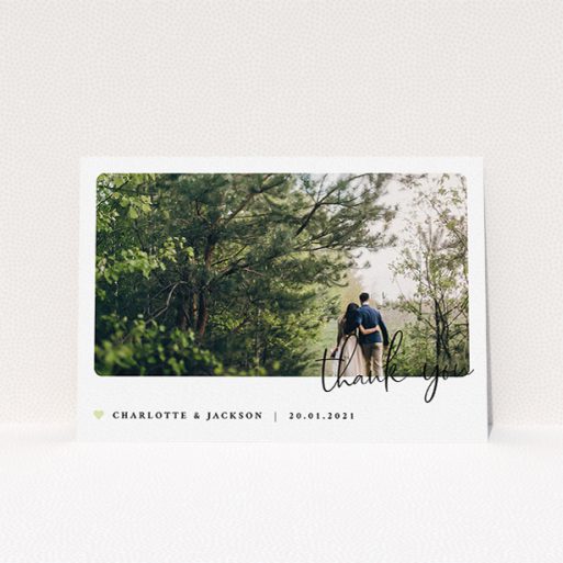 A photo wedding thank you card design named "Rounded-Off with Thanks". It is an A5 card in a landscape orientation. It is a photographic photo wedding thank you card with room for 1 photo. "Rounded-Off with Thanks" is available as a flat card, with mainly white colouring.