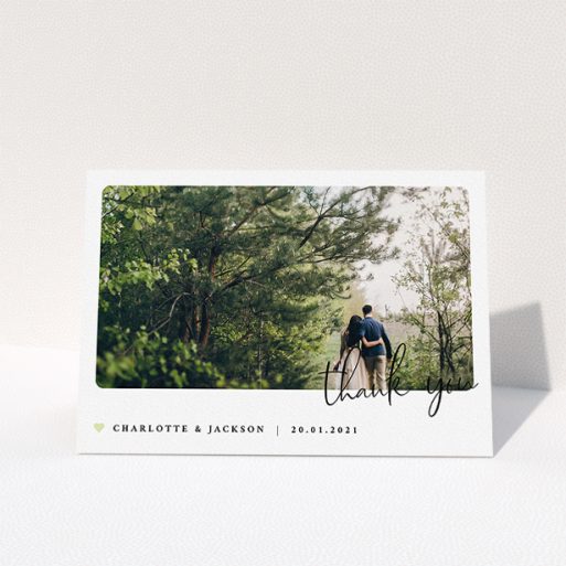 A photo wedding thank you card design titled "Rounded-Off with Thanks". It is an A5 card in a landscape orientation. It is a photographic photo wedding thank you card with room for 1 photo. "Rounded-Off with Thanks" is available as a folded card, with mainly white colouring.