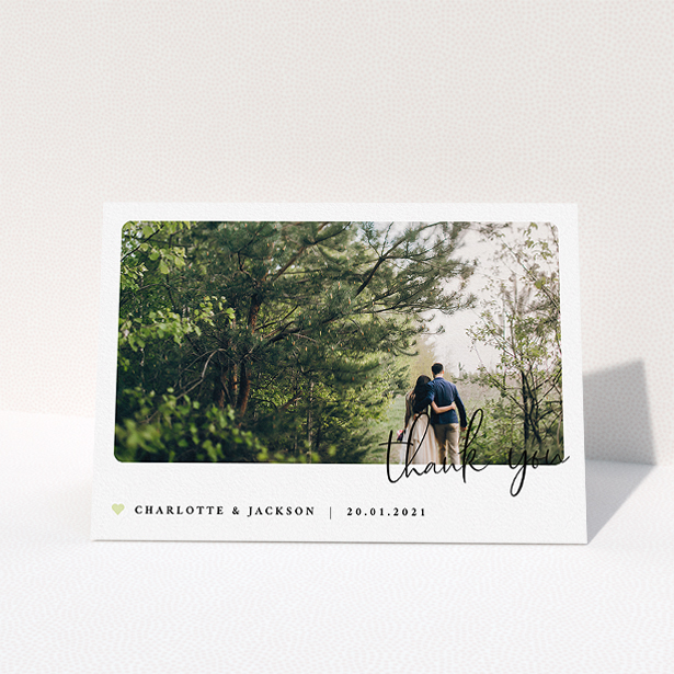 A photo wedding thank you card design titled "Rounded-Off with Thanks". It is an A5 card in a landscape orientation. It is a photographic photo wedding thank you card with room for 1 photo. "Rounded-Off with Thanks" is available as a folded card, with mainly white colouring.