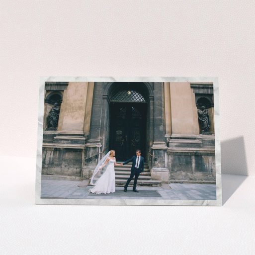 A photo wedding thank you card named "Sat on Marble". It is an A5 card in a landscape orientation. It is a photographic photo wedding thank you card with room for 1 photo. "Sat on Marble" is available as a folded card, with mainly white colouring.