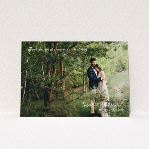 A photo wedding thank you card named "Scripted". It is an A6 card in a landscape orientation. It is a photographic photo wedding thank you card with room for 1 photo. "Scripted" is available as a flat card, with mainly white colouring.