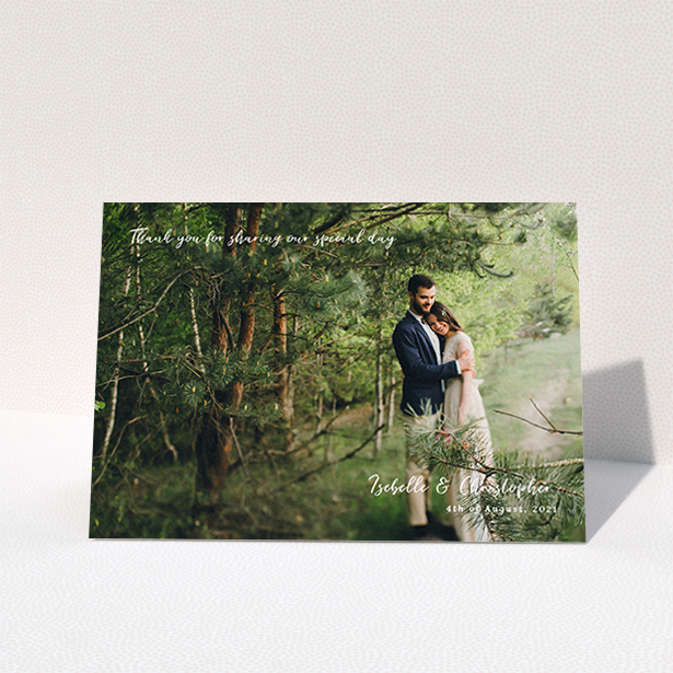 A photo wedding thank you card design called "Scripted". It is an A6 card in a landscape orientation. It is a photographic photo wedding thank you card with room for 1 photo. "Scripted" is available as a folded card, with mainly white colouring.