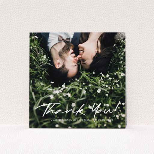 A photo wedding thank you card called "Simple Appreciation". It is a square (148mm x 148mm) card in a square orientation. It is a photographic photo wedding thank you card with room for 1 photo. "Simple Appreciation" is available as a flat card, with mainly white colouring.