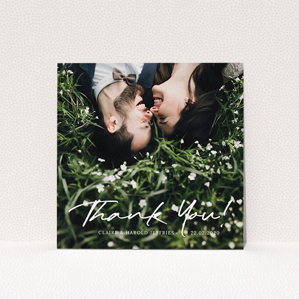 A photo wedding thank you card called "Simple Appreciation". It is a square (148mm x 148mm) card in a square orientation. It is a photographic photo wedding thank you card with room for 1 photo. "Simple Appreciation" is available as a flat card, with mainly white colouring.