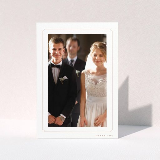 A photo wedding thank you card design named "Simple fine border". It is an A5 card in a portrait orientation. It is a photographic photo wedding thank you card with room for 1 photo. "Simple fine border" is available as a folded card, with tones of white and pink.