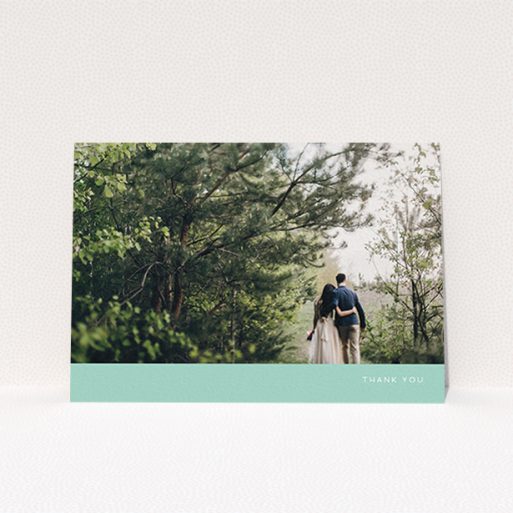 A photo wedding thank you card design called "Simple Mint". It is an A6 card in a landscape orientation. It is a photographic photo wedding thank you card with room for 1 photo. "Simple Mint" is available as a flat card, with tones of green and white.