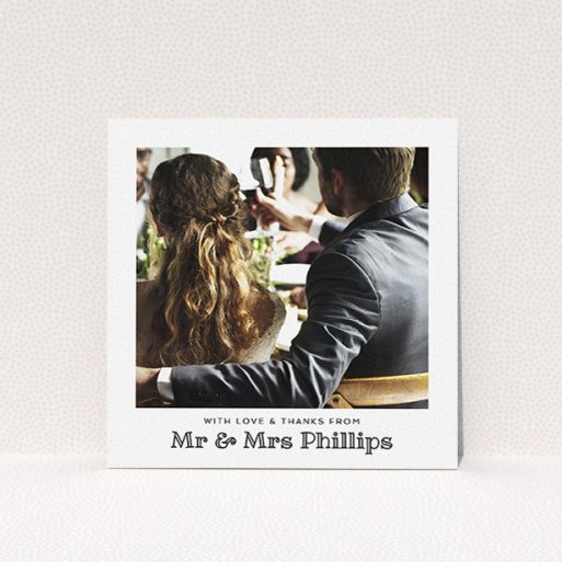 A photo wedding thank you card design titled "Simple Photo Frame". It is a square (148mm x 148mm) card in a square orientation. It is a photographic photo wedding thank you card with room for 1 photo. "Simple Photo Frame" is available as a flat card, with mainly white colouring.