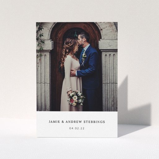 A photo wedding thank you card design named "Simple, Portrait Thank You". It is an A5 card in a portrait orientation. It is a photographic photo wedding thank you card with room for 1 photo. "Simple, Portrait Thank You" is available as a folded card, with mainly white colouring.