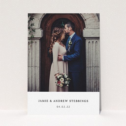 A photo wedding thank you card called "Simple, Portrait Thank You". It is an A6 card in a portrait orientation. It is a photographic photo wedding thank you card with room for 1 photo. "Simple, Portrait Thank You" is available as a flat card, with mainly white colouring.
