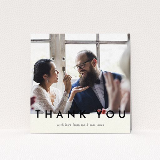 A photo wedding thank you card design titled "Split thank you ". It is a square (148mm x 148mm) card in a square orientation. It is a photographic photo wedding thank you card with room for 1 photo. "Split thank you " is available as a flat card, with mainly cream colouring.