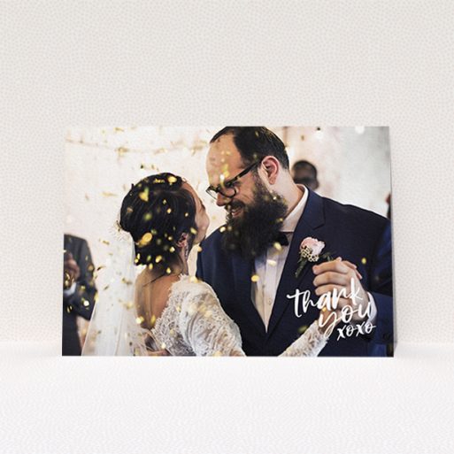 A photo wedding thank you card called "Thanks In the Corner". It is an A6 card in a landscape orientation. It is a photographic photo wedding thank you card with room for 1 photo. "Thanks In the Corner" is available as a flat card, with mainly white colouring.