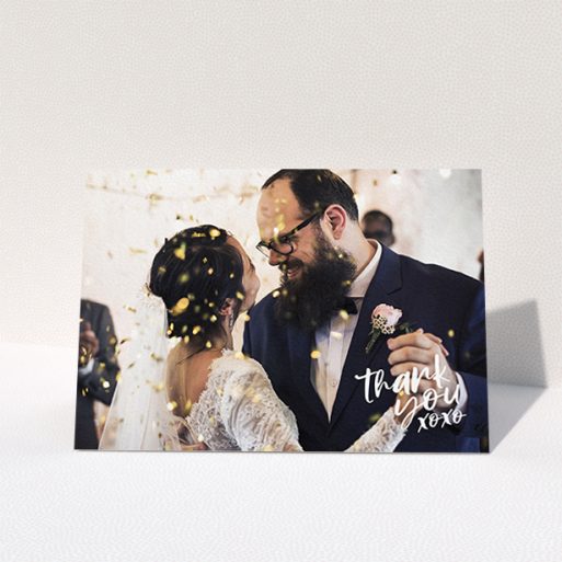 A photo wedding thank you card design titled "Thanks In the Corner". It is an A6 card in a landscape orientation. It is a photographic photo wedding thank you card with room for 1 photo. "Thanks In the Corner" is available as a folded card, with mainly white colouring.