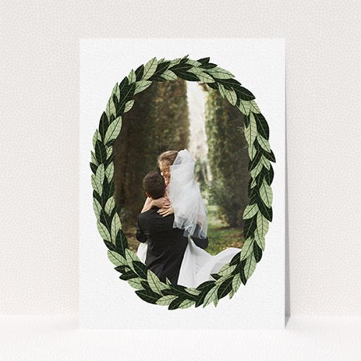 A photo wedding thank you card design titled "Thick Wreath Frame". It is an A6 card in a portrait orientation. It is a photographic photo wedding thank you card with room for 1 photo. "Thick Wreath Frame" is available as a flat card, with tones of light green and dark green.