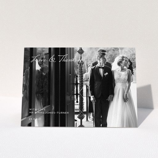 A photo wedding thank you card design named "To the Left Photo". It is an A6 card in a landscape orientation. It is a photographic photo wedding thank you card with room for 1 photo. "To the Left Photo" is available as a folded card, with mainly white colouring.