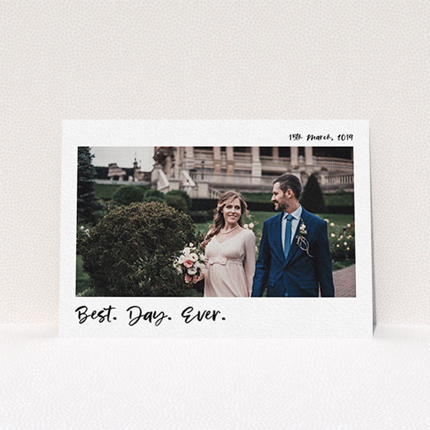 A photo wedding thank you card design named "Top and Bottom Thanks". It is an A6 card in a landscape orientation. It is a photographic photo wedding thank you card with room for 1 photo. "Top and Bottom Thanks" is available as a flat card, with mainly white colouring.