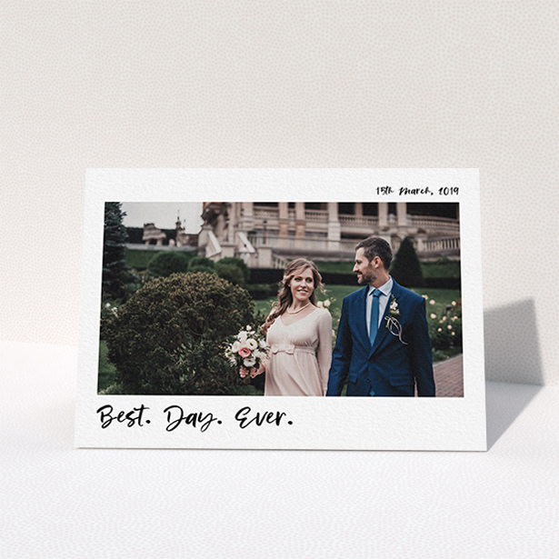 A photo wedding thank you card called "Top and Bottom Thanks". It is an A6 card in a landscape orientation. It is a photographic photo wedding thank you card with room for 1 photo. "Top and Bottom Thanks" is available as a folded card, with mainly white colouring.
