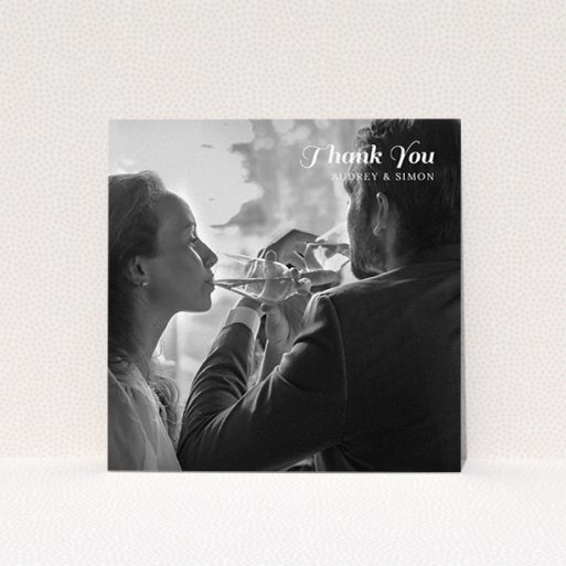 A photo wedding thank you card design called "Top-Right". It is a square (148mm x 148mm) card in a square orientation. It is a photographic photo wedding thank you card with room for 1 photo. "Top-Right" is available as a flat card, with mainly white colouring.