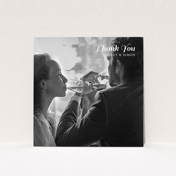 A photo wedding thank you card design called "Top-Right". It is a square (148mm x 148mm) card in a square orientation. It is a photographic photo wedding thank you card with room for 1 photo. "Top-Right" is available as a flat card, with mainly white colouring.