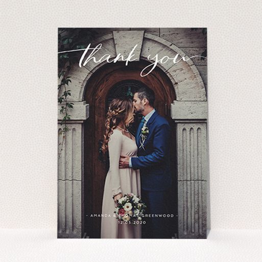 A photo wedding thank you card named "Topped and Bottomed". It is an A6 card in a portrait orientation. It is a photographic photo wedding thank you card with room for 1 photo. "Topped and Bottomed" is available as a flat card, with mainly white colouring.