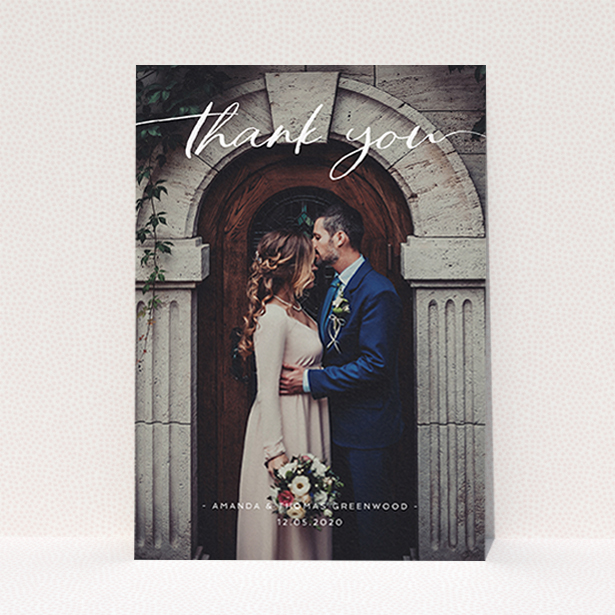 A photo wedding thank you card named "Topped and Bottomed". It is an A6 card in a portrait orientation. It is a photographic photo wedding thank you card with room for 1 photo. "Topped and Bottomed" is available as a flat card, with mainly white colouring.