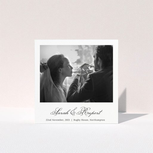 A photo wedding thank you card design named "Traditional Photo Thanks". It is a square (148mm x 148mm) card in a square orientation. It is a photographic photo wedding thank you card with room for 1 photo. "Traditional Photo Thanks" is available as a folded card, with mainly white colouring.