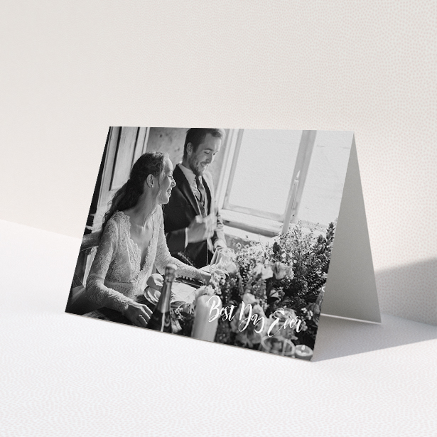 A photo wedding thank you card design titled "Truly It Was". It is an A5 card in a landscape orientation. It is a photographic photo wedding thank you card with room for 1 photo. "Truly It Was" is available as a folded card, with mainly white colouring.