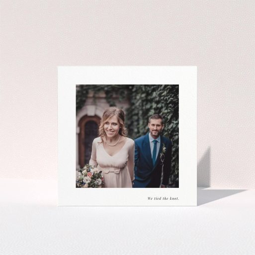 A photo wedding thank you card design titled "We tied the knot". It is a square (148mm x 148mm) card in a square orientation. It is a photographic photo wedding thank you card with room for 1 photo. "We tied the knot" is available as a folded card, with mainly white colouring.