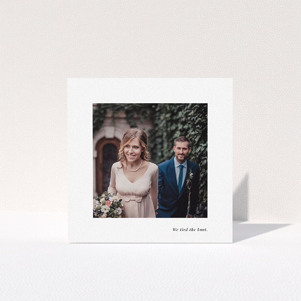 A photo wedding thank you card design titled "We tied the knot". It is a square (148mm x 148mm) card in a square orientation. It is a photographic photo wedding thank you card with room for 1 photo. "We tied the knot" is available as a folded card, with mainly white colouring.