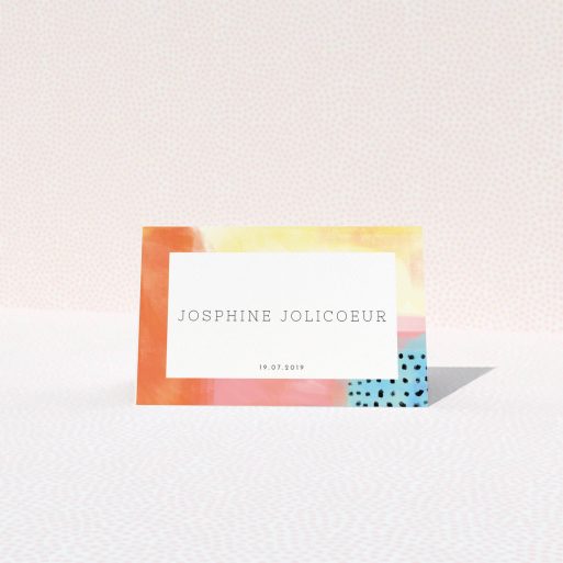 Place Setting Card Design - "Abstract Colours" A place setting card template titled "Abstract Colours". It is an 85 x 55mm card in a landscape orientation. "Abstract Colours" is available as a folded card, with tones of orange, red and yellow.
