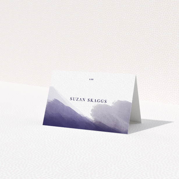 A place setting card called 'Blue and Cream'. It is an 85 x 55mm card in a landscape orientation. 'Blue and Cream' is available as a folded card, with mainly purple/dark pink colouring.