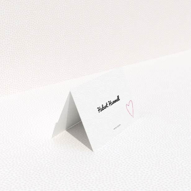 A place setting card design called "Casual Loving". It is an 85 x 55mm card in a landscape orientation. "Casual Loving" is available as a folded card, with tones of white and pink.