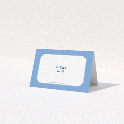 A place setting card called 'Ceramic Blue Edge'. It is an 85 x 55mm card in a landscape orientation. 'Ceramic Blue Edge' is available as a folded card, with tones of blue and white.