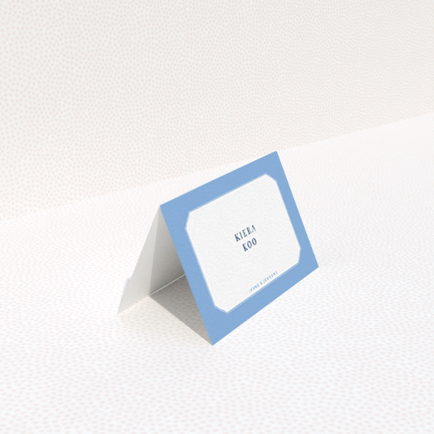 A place setting card called "Ceramic Blue Edge". It is an 85 x 55mm card in a landscape orientation. "Ceramic Blue Edge" is available as a folded card, with tones of blue and white.